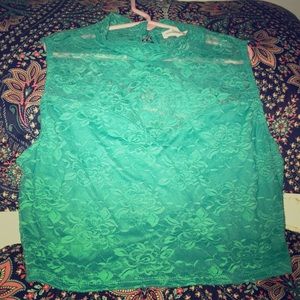 Teal blue lace crop top.